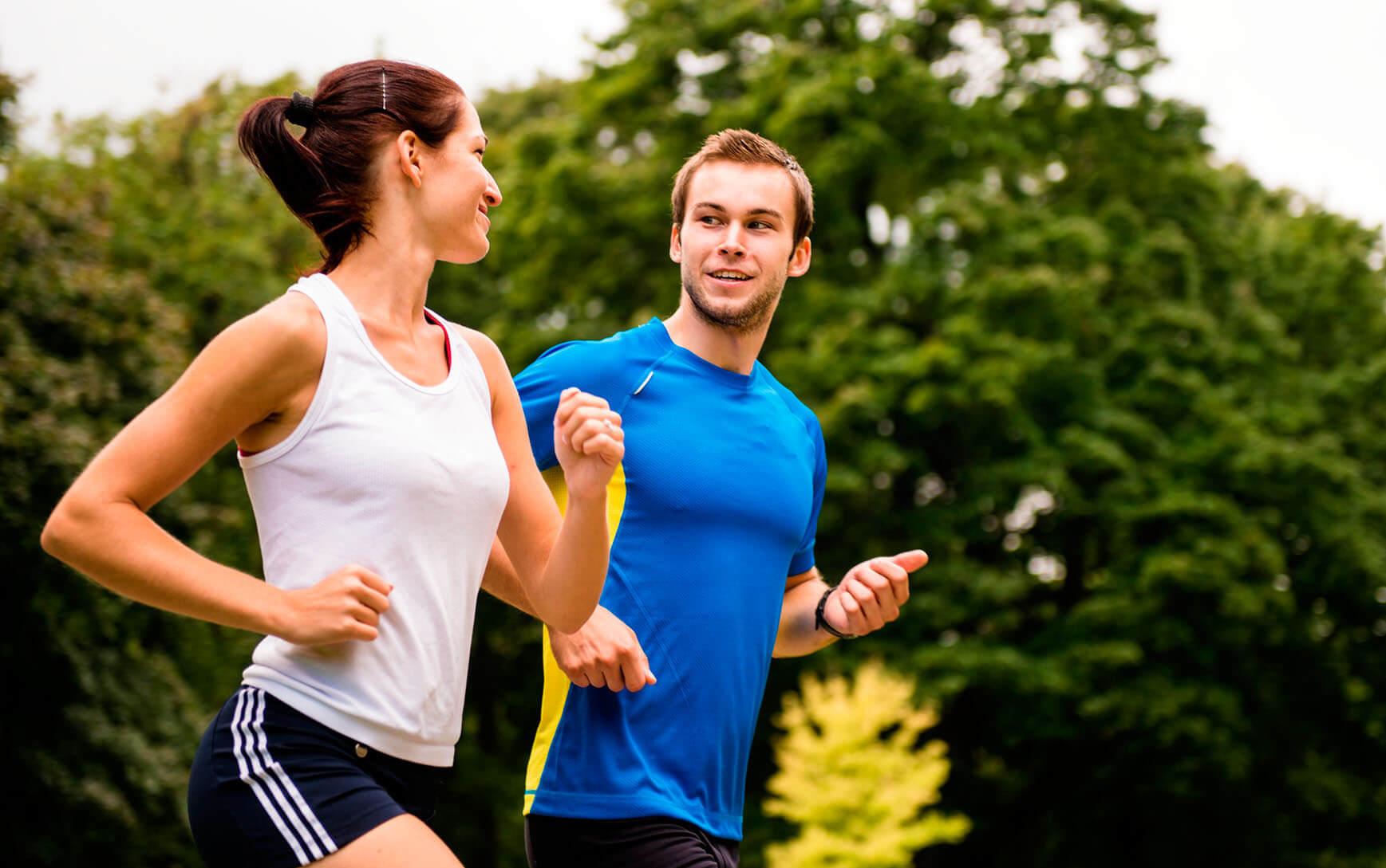 Running together - young couple jogging